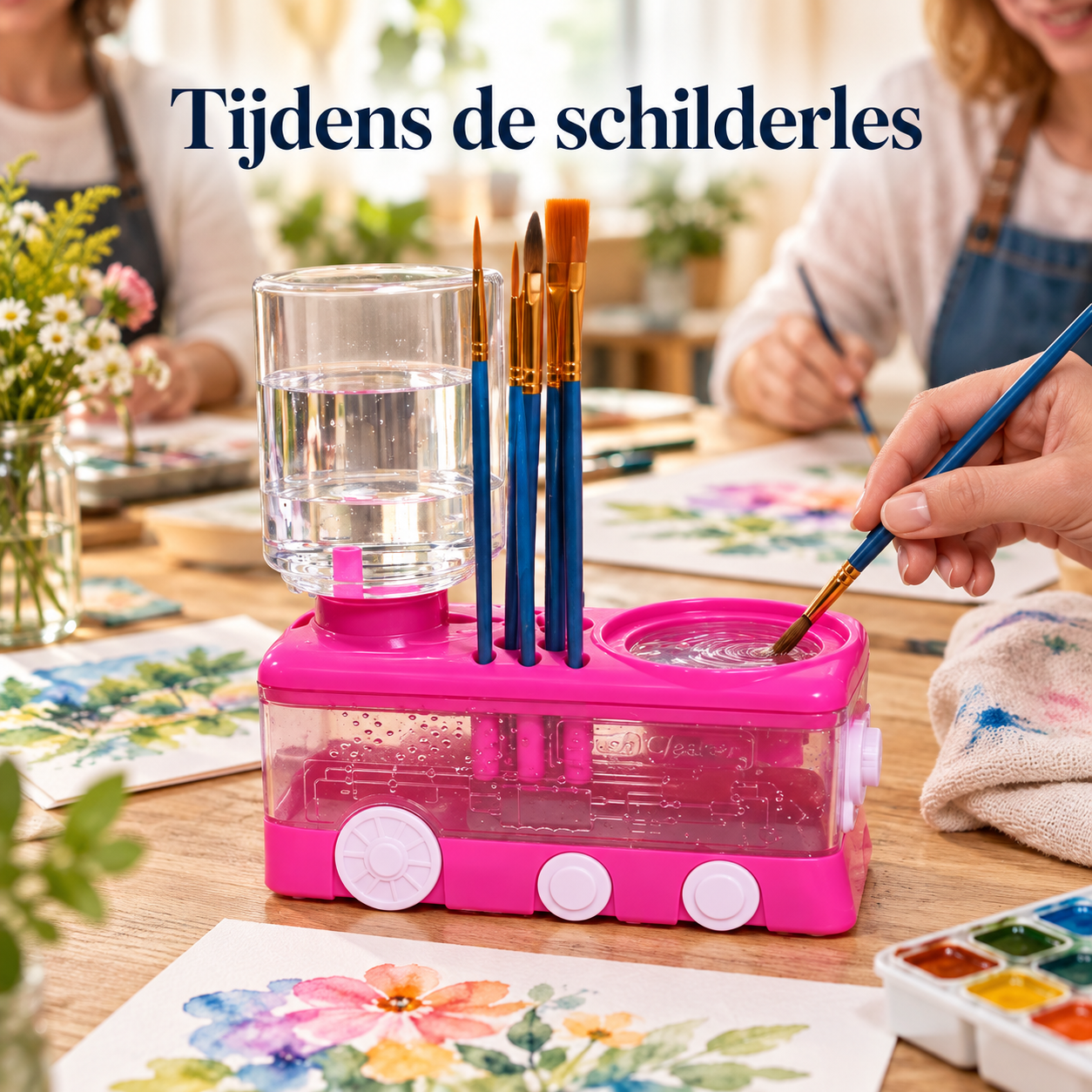 Roze BrushFlow op een tafel tijdens een schilderles met waterverf